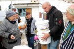 Sergei from SaveUA hands out filters in Novovorontsovo