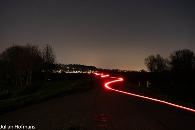 Time to go home, playing with long exposure times on the dike of Wageningen