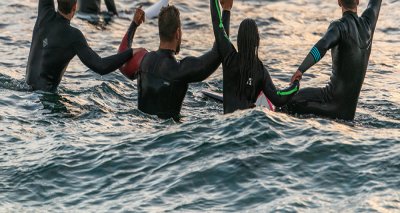 Surfers waiting for a big wave - Unsplash Guy Kawasaki