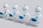 A group of white robots sitting in front of blue laptops